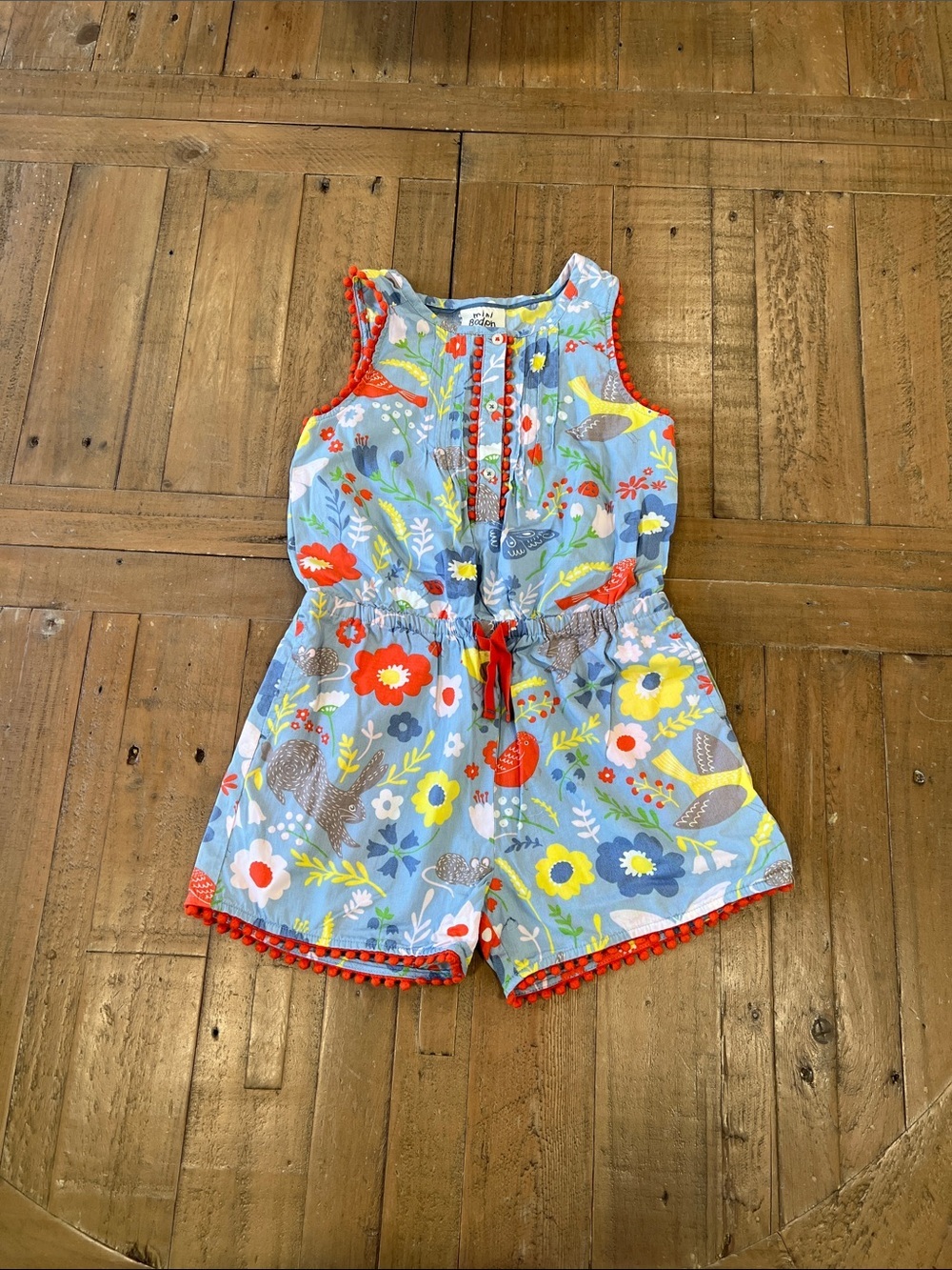 Mini Boden blue animal print floral Pom Pom romper 4-5 years butterfly birds